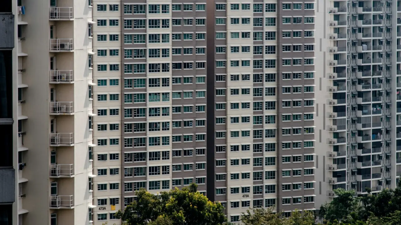 Rows of windows on a high-rise residential block, illustrating the units in a balance chart